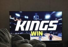 Breaking Sports News: Game-Changing Moments Happening Now Messy couch with TV showing "KINGS WIN" graphic and scattered chips
