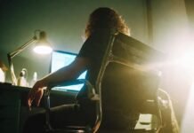 Tech News Live: AI, Cybersecurity & Startup Headlines Slouched person in creaky IKEA chair taking selfie